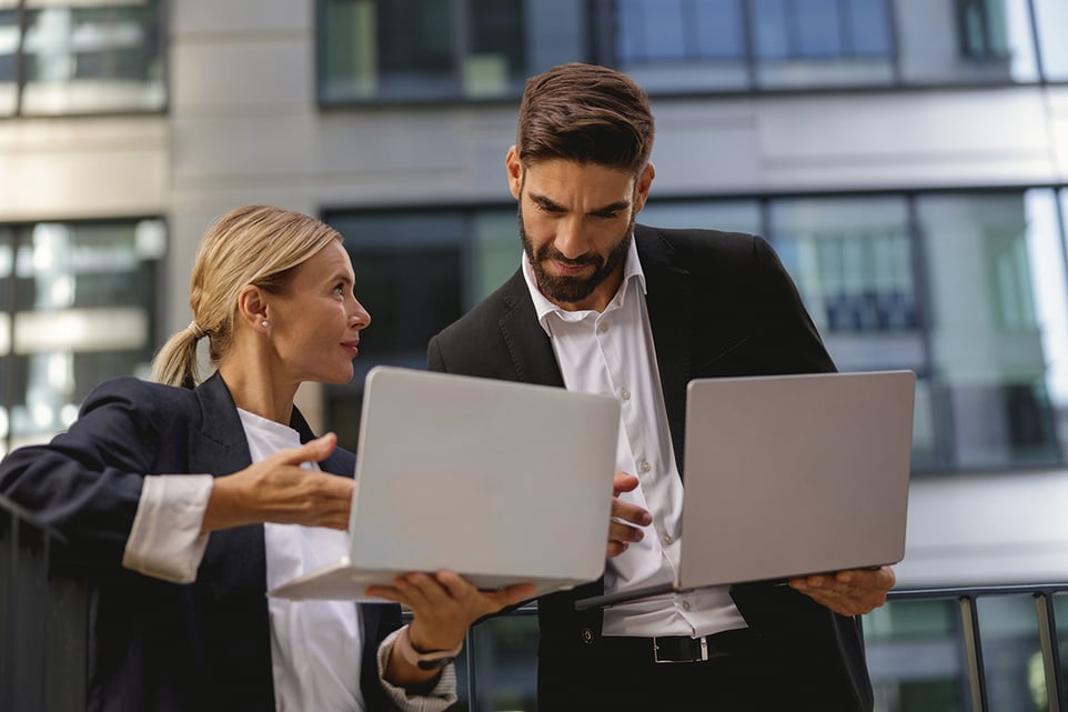 two people working together